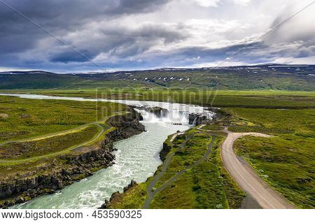 Aerial View Of The Godafoss Waterfall In Iceland. Godafoss Means The Waterfall Of The Gods In Icelan