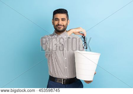 Portrait Of Smiling Happy Satisfied Businessman Throwing Out His Optical Glasses After Vision Treatm