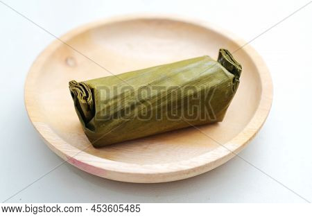Arem-arem, Lemper, Lontong - Traditional Food Wrapped In Banana Leaf On White Background