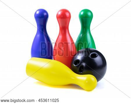 Set Of Collored Bowling Pins And Ball Isolated On A White Background. Skittles Isolated On A White B