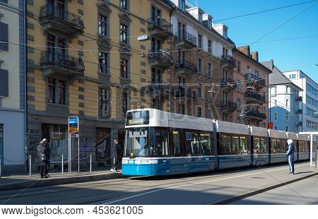 Zurich, Switzerland - March 5th 2022: Public Transport Stop Loewenbraeu With The Modern Tram Flexity