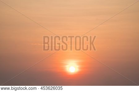 Beautiful Sky Painted By The Sun Leaving Bright Golden Shades.dense Clouds In Twilight Sky In Winter