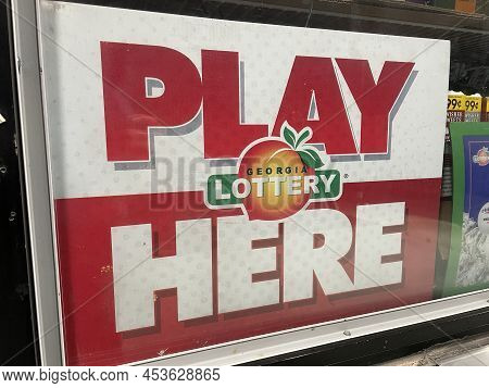 Augusta, Ga Usa - 04 27 22: Georgia Lottery Play Here Sign And Logo