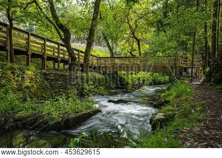 Surrounding Landscape Of The Estanislau Fountain Park And The Lourido River That Divides The Parishe
