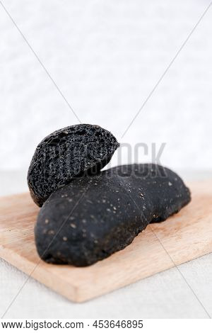 Black Long John Buns Bread With Copy Space For Text