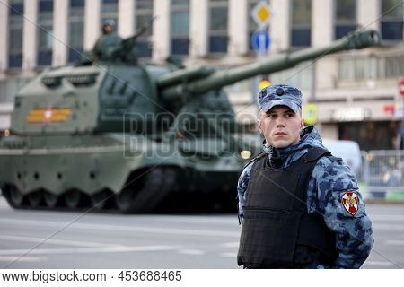Moscow, Russia - April 2022: Soldier Of Russian Military Forces Of National Guard Standing On Backgr