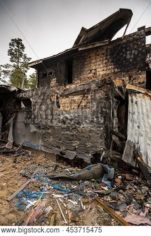 Hostomel, Kyev Region Ukraine - 09.04.2022: Cities Of Ukraine After The Russian Occupation. Houses T