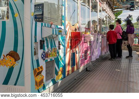 Palma De Mallorca, Spain; April 08 2022: Attractions And People At The Traditional Annual Fair, Fira