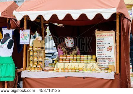 Hodonin, Czech Republic - April 23, 2022: Detail Of A Stall With Mustard At A Farmers Market With A