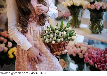 Woman Make Spring Bouquet. Female Floris Put Bouquet Of White Tulips. Beautiful Flower Composition. 