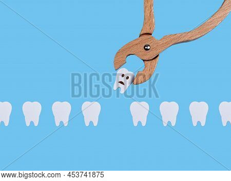 Teeth Row And Dental Forceps. Pulling Bad Sick Tooth With Sad Emoji Because Of Decay, Periodontal Di