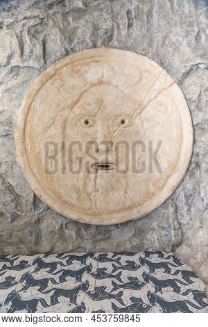 Mouth Of Truth Sightseeing In Rome, Italy. Historical Sculpture Made Of Marble With Antique Face Ful