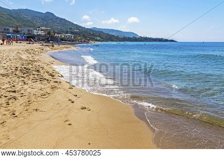 Golden Sand Of Cefalu Beach, Cefalu Town, Sicily, Italy. Cefalu Has A Long And Lovely Beach With Cle