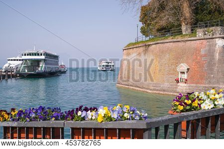 Italy, Peschiera Del Garda, The Harbor On The Garda Lake With The Ancient Fortified Walls Of The Tow