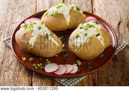 Classic Poznan Specialty Pyry Z Gzikiem Is A Simple Potato And Cheese Dish Close-up In A Plate On A 