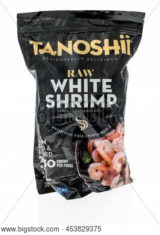Winneconne, Wi -23 April 2022: A Package Of Tanoshii Raw White Shrimp On An Isolated Background