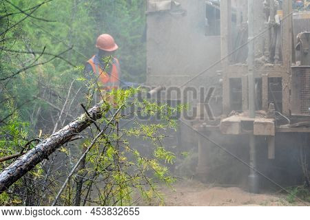 The Crawler Drilling Rig Drills Well, There Is A Lot Of Dust When Drilling A Well. Drilling Of Explo