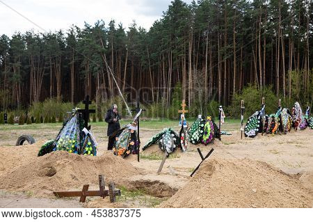 War In Ukraine. Cemetery In Irpen With Fresh Graves
