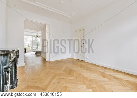 Large Empty Spacious Bright White Loft Room With Door To The Next Room