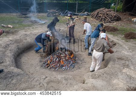 Amarante, Portugal - April 30: Stage Of Covering With Pine Needles Of The Bonfire With The Pieces Of
