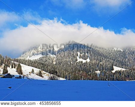 Icy Winter Atmosphere And Low Clouds On A Snowy Peak Stockberg (1781 M) In The Alpstein Mountain Ran