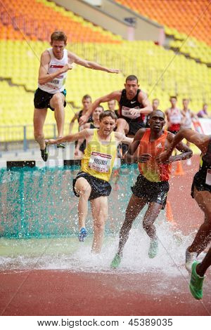 MOSCOW - JUN 11: Men obstacle race at Grand Sports Arena of Luzhniki OC during International athletics competitions IAAF World Challenge Moscow Challenge, June 11, 2012, Moscow, Russia.