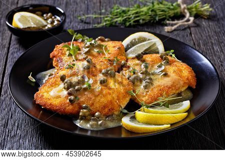 Delicious Chicken Piccata Of Parmesan Breaded Seared Chicken Breasts With Lemon Butter Caper Sauce O
