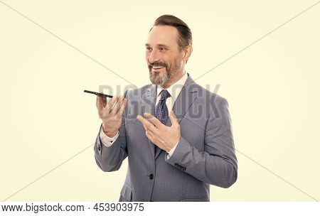 Smiling Grizzled Business Man In Suit Send Voice Message On Phone Isolated On White, Voice Message.