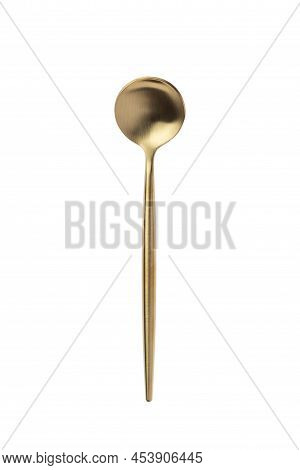 Small Round Golden Spoon Isolated On A White Background. Top View. Metal Teaspoon