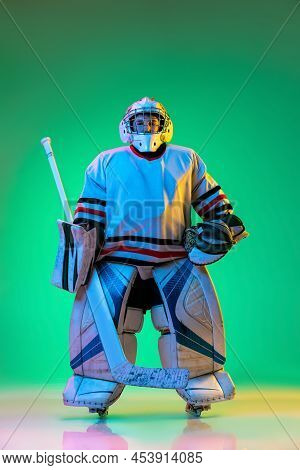 Portrait Of Young Boy, Hockey Player In Special Protective Uniform Of Goalkeeper Posing Isolated Ove