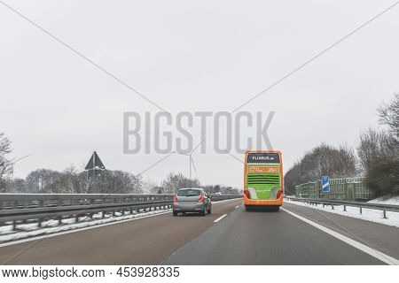 Germany, Autobahn A6 Direction To Nürnberg, December 17, 2017, Flixbus Bus And Cars On The Autobahn 