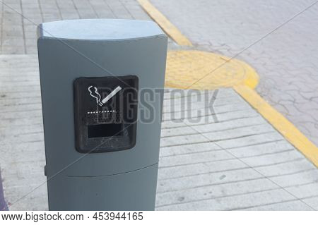 Modern Cigarette Trash Bin In The Street, Outdoors. Litter Bin, With A Ashtray. Outdoor Smoking Area