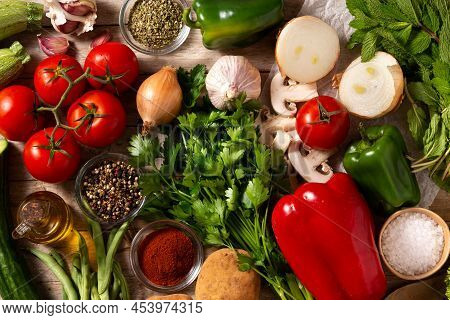 Background Assortment Of Vegetables, Herbs And Spices. Top View