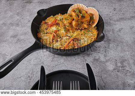 Peruvian Food: Rice With Seafood. Arroz Con Mariscos, Food Served In Pan, Selective Focus.