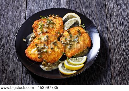 Delicious Chicken Piccata Of Parmesan Breaded Seared Chicken Breasts With Lemon Butter Caper Sauce O