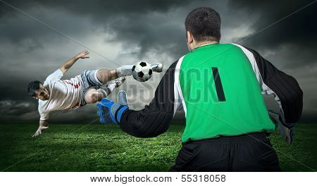 Two Football players in action outdoors