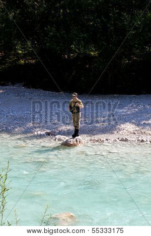 Fisherman In The Soca River, Slovenia