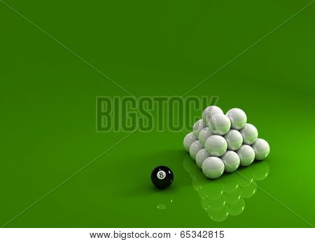 Eight ball laying next to a pyramid of white pool balls