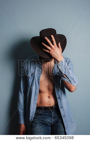 Sexy Young Cowboy With His Shirt Open