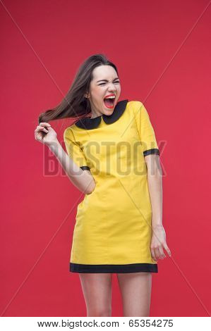 Woman half length on red background
