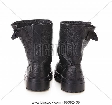 Black kersey pair of boots close up.
