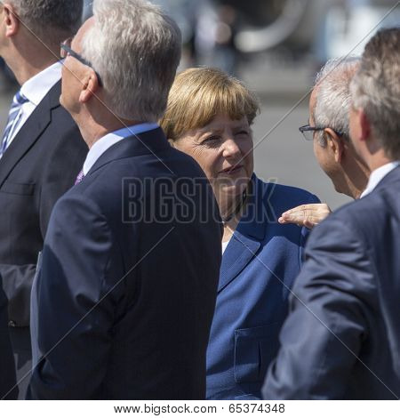 BERLIN, GERMANY - MAY 20, 2014: German Chancellor Angela Merkel (C) during open the International aviation and space exhibition ILA-2014.