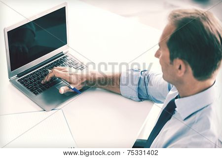 business, office, school and education concept - smiling businessman working in office