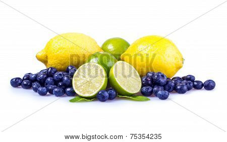 Fresh blueberries green leaves, citrus fruit - lemon limet