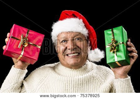 Poignant Aged Man Showing Red And Green Xmas Gifts
