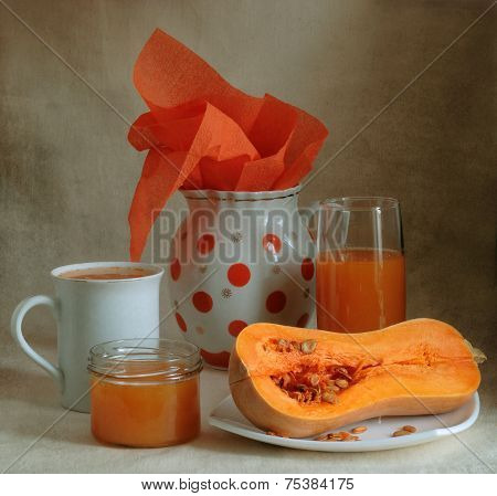 Still-life with a pumpkin and pumpkin juice
