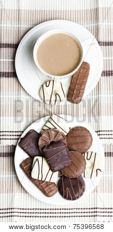 cup of coffee with chocolete biscuits
