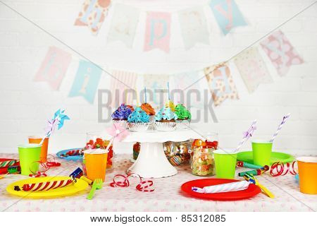 Prepared birthday table with sweets for children party