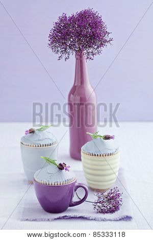 Three lavender cupcakes