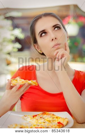 Young Woman Thinking About Eating Pizza on a Diet